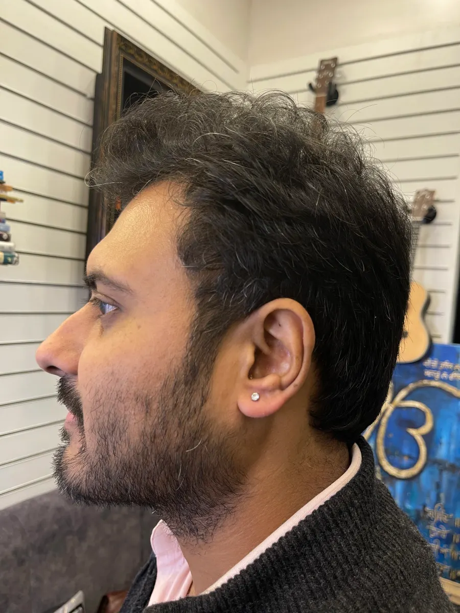 Men ear piercing